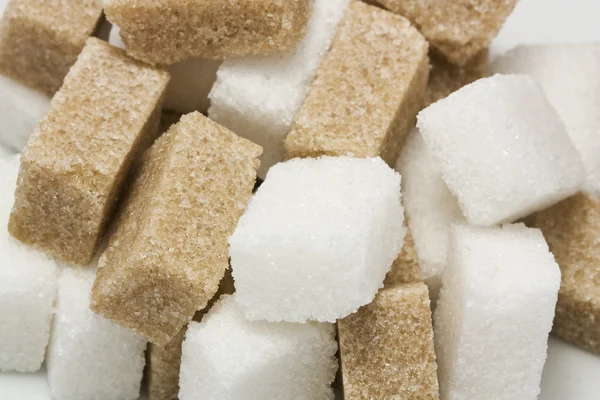 White and brown sugar cubes — Stock Photo, Image