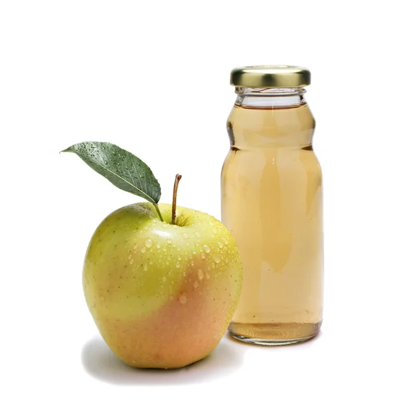 Пляшка яблучного соку і трохи свіжого додатку — стокове фото