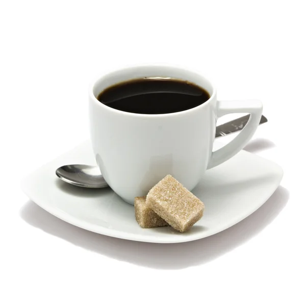 Suikerklontjes en kopje koffie Stockfoto