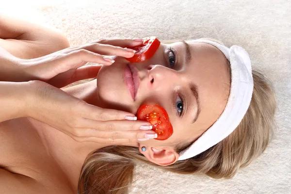 Woman with fresh tomatoes mask — Stock Photo, Image