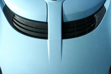 Blue sports car hood with scoop clipart