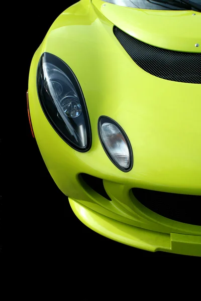 Žluté sportovní auto čelní pohled — Stock fotografie