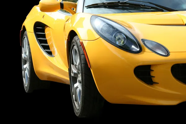 블랙에 고립 된 노란색 스포츠 자동차 — 스톡 사진