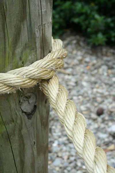 A piece of Rope wrapped around a pole — Stock Photo, Image