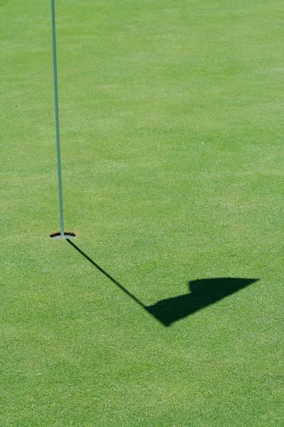 Golfe verde bandeira sombra — Fotografia de Stock