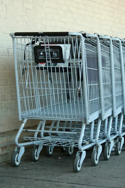 Grey metal shopping carts — Stock Photo, Image