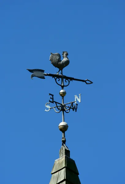 Old historic roof with weather vane — Stock Photo, Image
