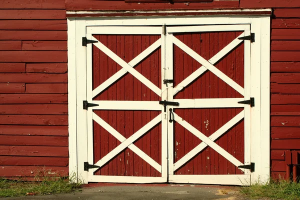 Old red bard doors — Stock Photo, Image