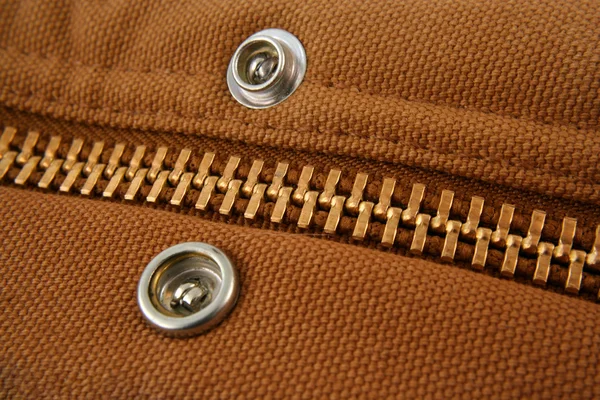 Large gold zipper macro with snaps — Stock Photo, Image