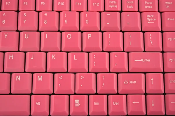 Pembe bilgisayar klavye arka plan — Stok fotoğraf