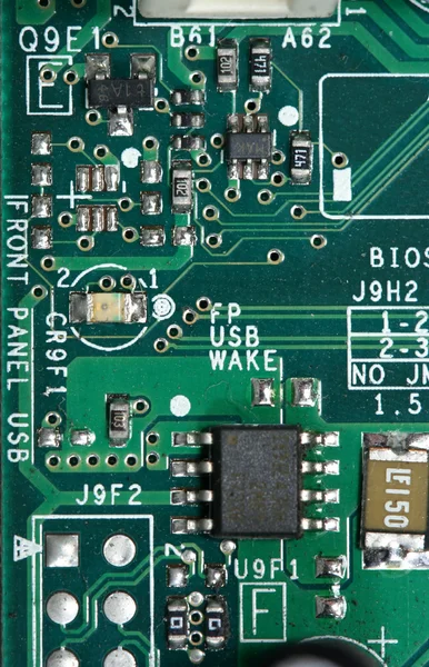 Computer chip and circuit board — Stock Photo, Image