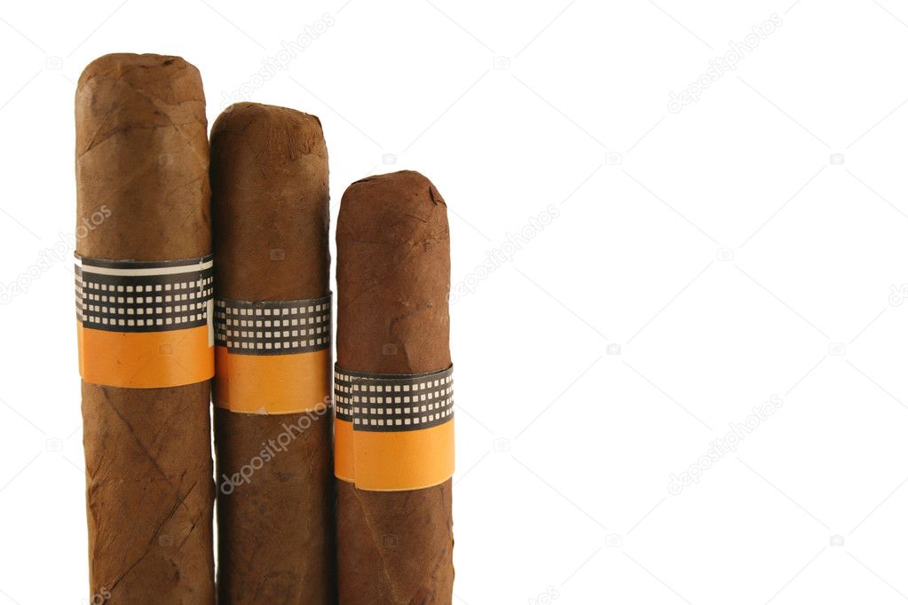 Three isolated cigars on white