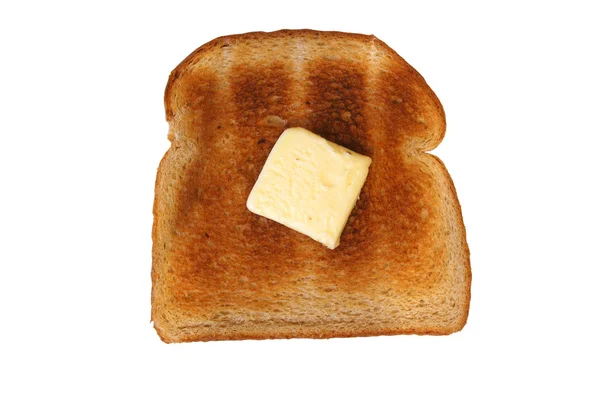 Na białym tle kromka Grzanka z masłem — Zdjęcie stockowe