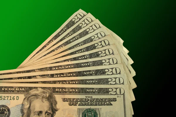 Vinte notas de dólar espalhadas — Fotografia de Stock