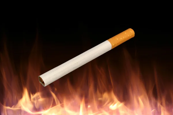 Vereinzelte Zigarette auf dem Brandhintergrund — Stockfoto