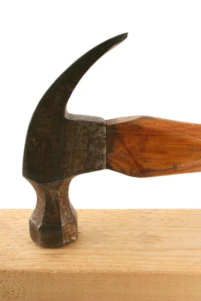 Isolated old hammer on wood — Stock Photo, Image