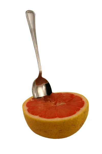 Isolated pink grapefruit half with spoon — Stock Photo, Image