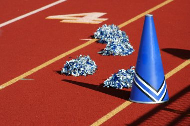 Cheerleader pom poms and megaphone clipart