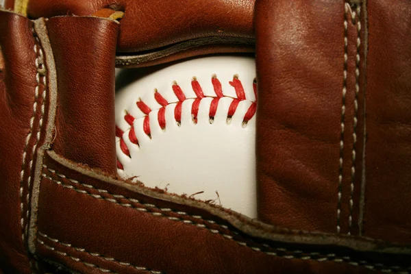Baseball in a glove — Stock Photo, Image
