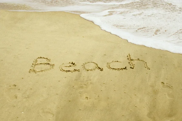 Beach written in sand — Stock Photo, Image