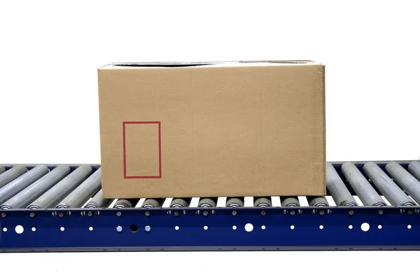 Carton on conveyor — Stock Photo, Image