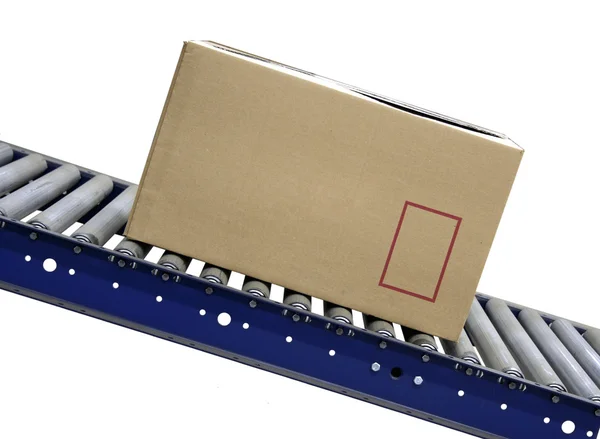 Carton on conveyor — Stock Photo, Image