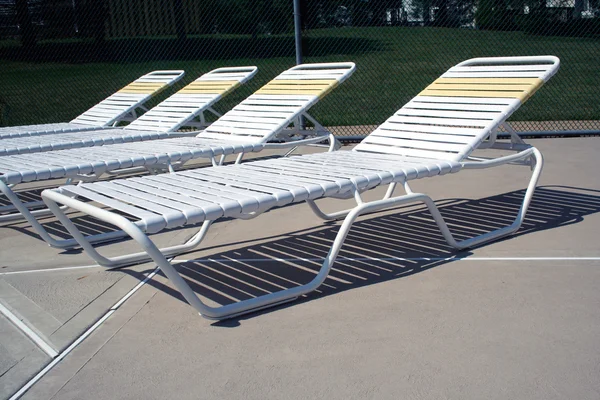 stock image Reclining chairs at the pool