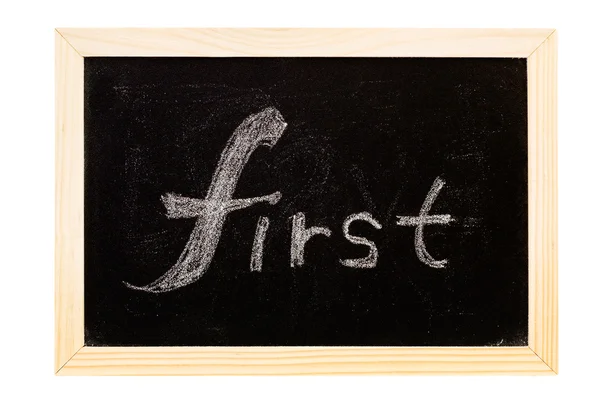 Blackboard written "first" — Stock Photo, Image
