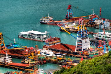 Colorful boats in the harbor clipart