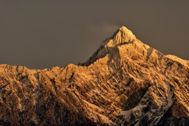 Mountain peak in dawn clipart