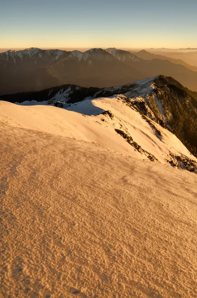 Sunset snow lutning — Stockfoto