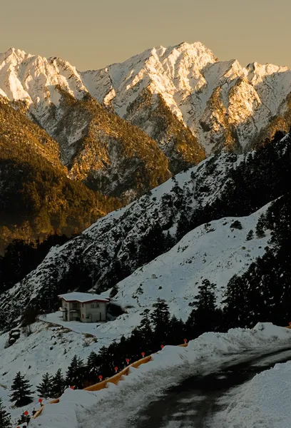 Sunset of snow mountain — Stock Photo, Image