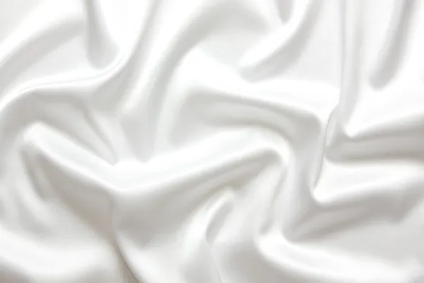 Bílé hedvábí textilního pozadí — Stock fotografie