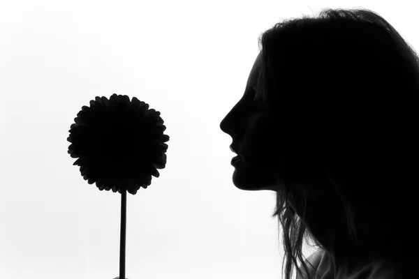 The girl with the big flower — Stock Photo, Image