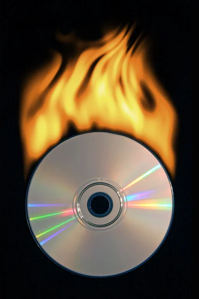 Burning compact disc — Stock Photo, Image