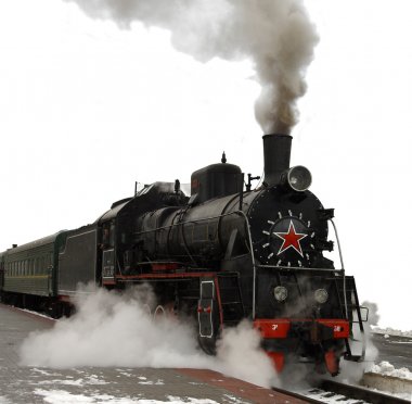 Steam locomotive.Ancient train with a steam locomotive clipart