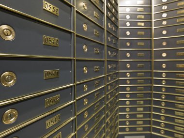 Rows of luxurious safe deposit boxes clipart