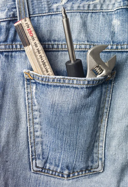 Ferramentas no bolso jeans — Fotografia de Stock