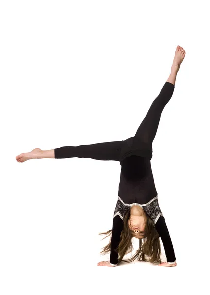 Young girl doing gymnastics Royalty Free Stock Images