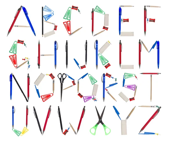 Алфавит, образованный канцелярскими принадлежностями — стоковое фото