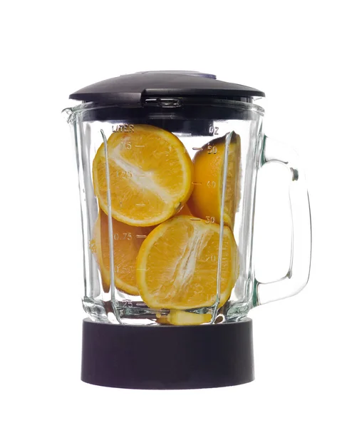 Licuadora con naranjas — Foto de Stock