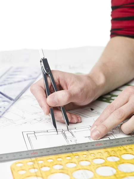 Architect working on a blueprint — Stock Photo, Image