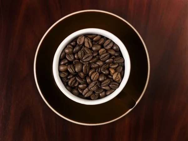 Kaffe bönor i cupen — Stockfoto