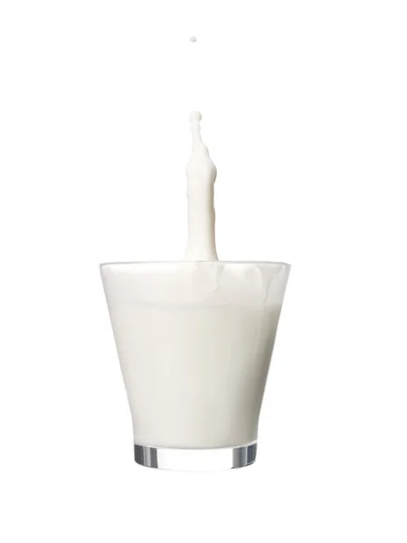 Glass milk splashing — Stock Photo, Image
