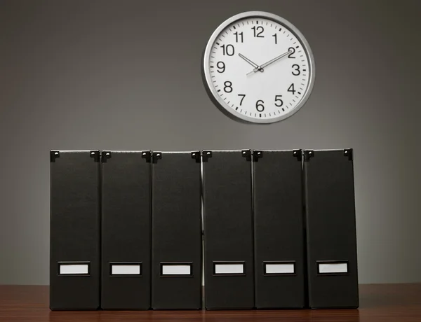 Folders and clock — Stock Photo, Image