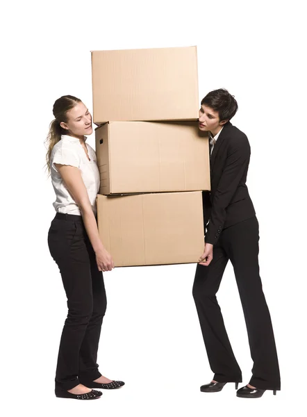 Women carrying boxes — Stock Photo, Image