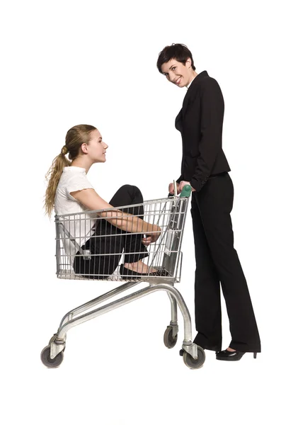 Mujeres y carrito de compras —  Fotos de Stock