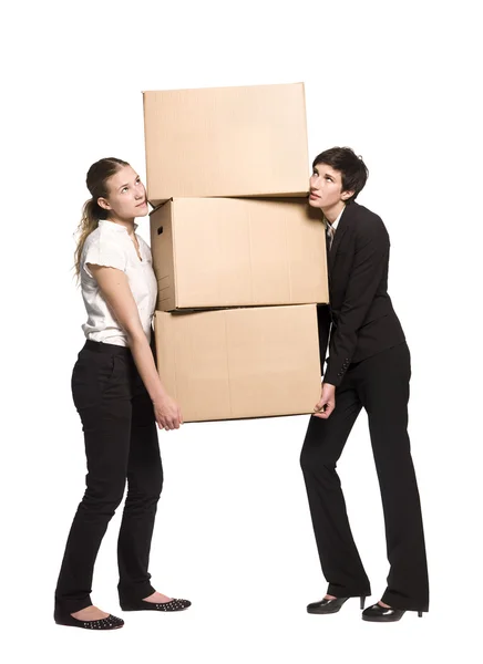 Kvinnor bära lådor — Stockfoto
