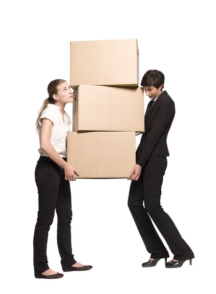 Mulheres com caixas — Fotografia de Stock