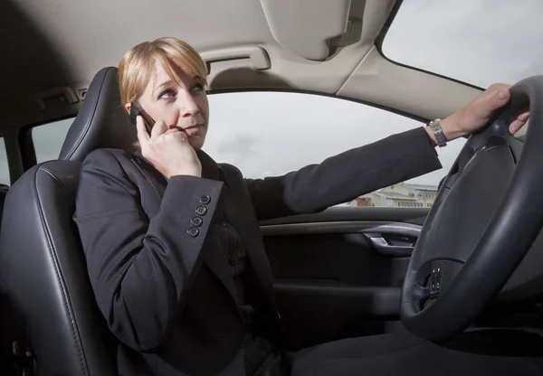 Businesswoman in car — Stock Photo, Image